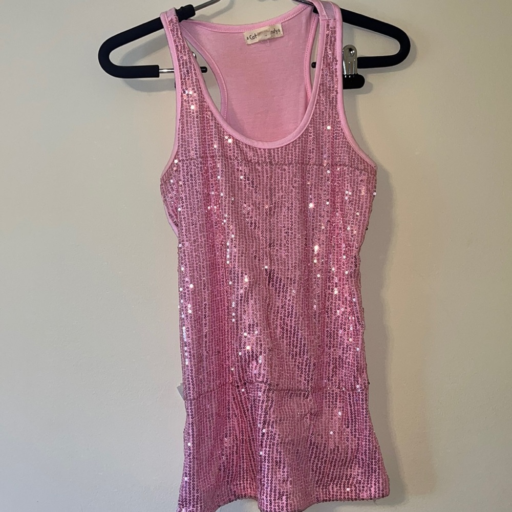 A pink  sparkly tank top